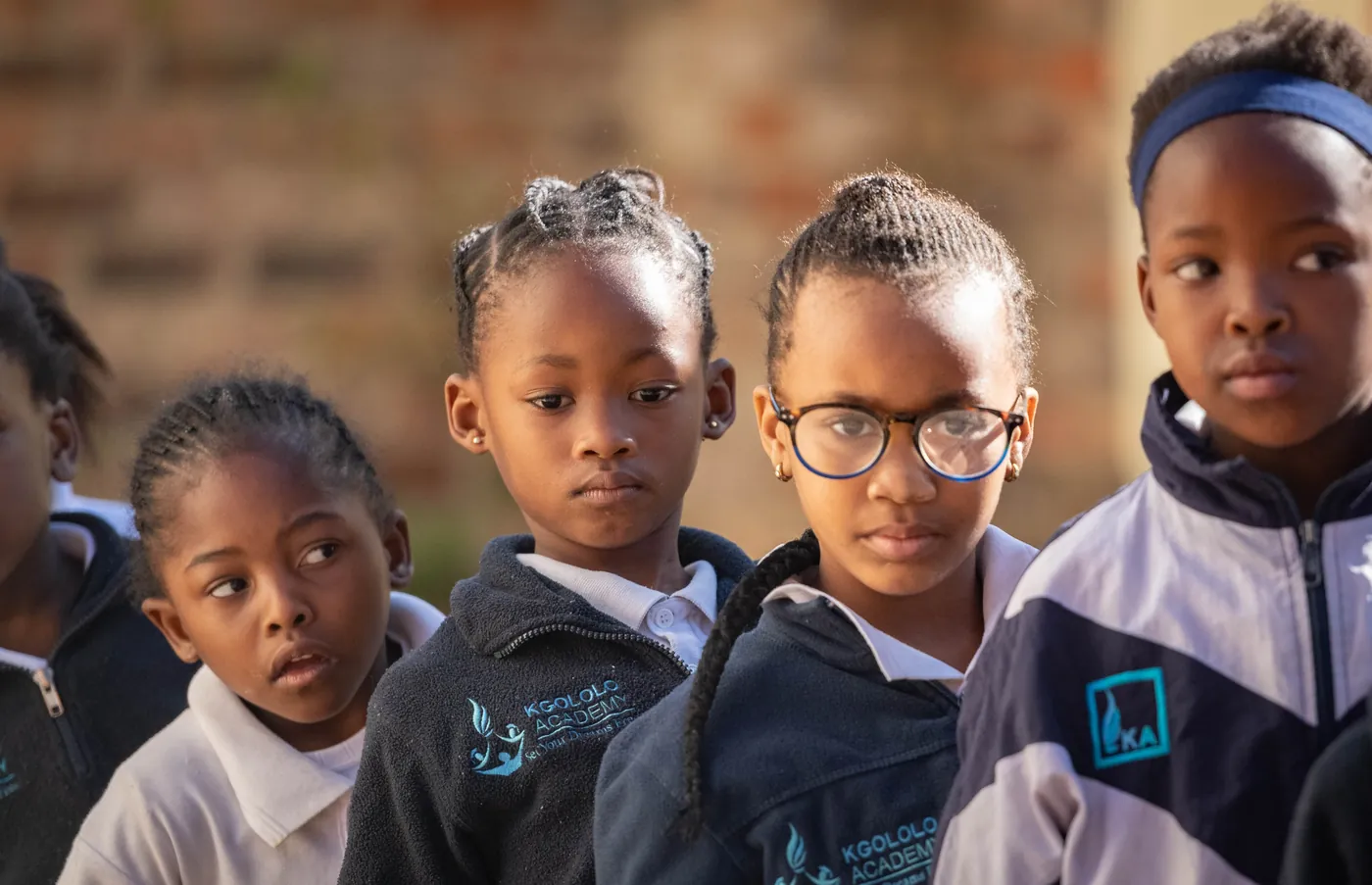Kgololo Academy girls in their school jackets smiling together