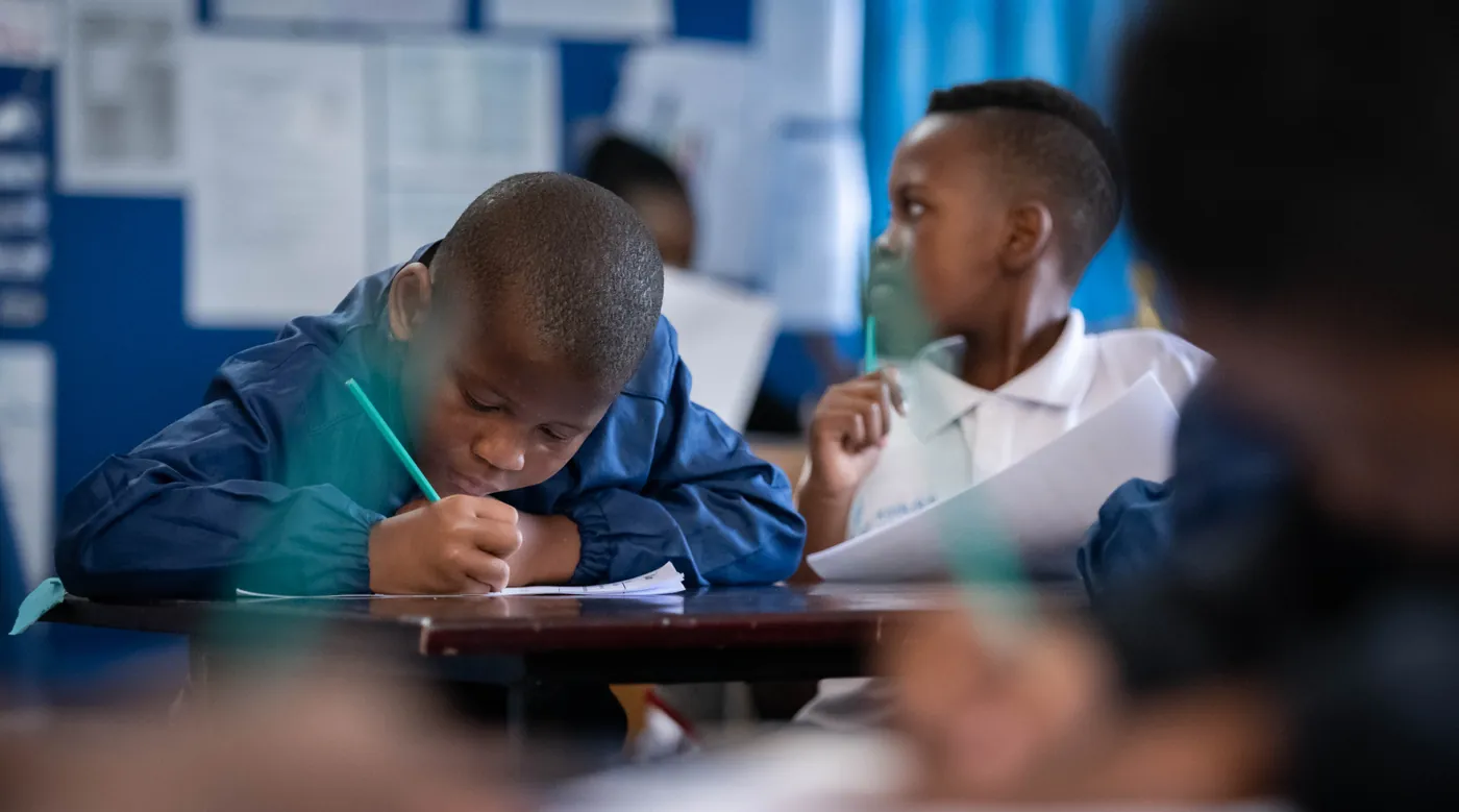 Kgololo Academy learners working at their desks