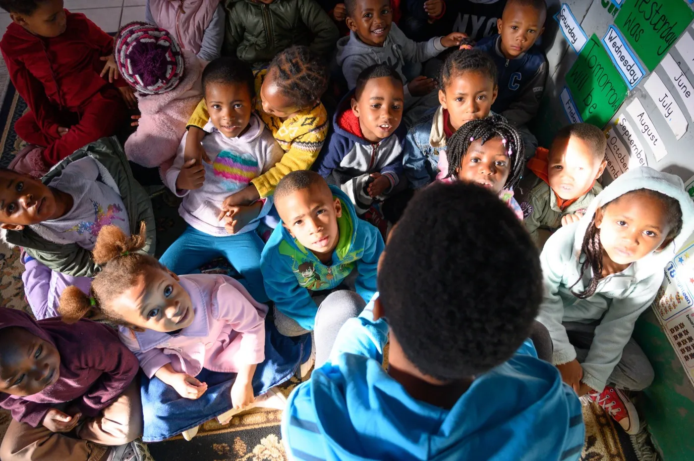 Children in conversation at True North